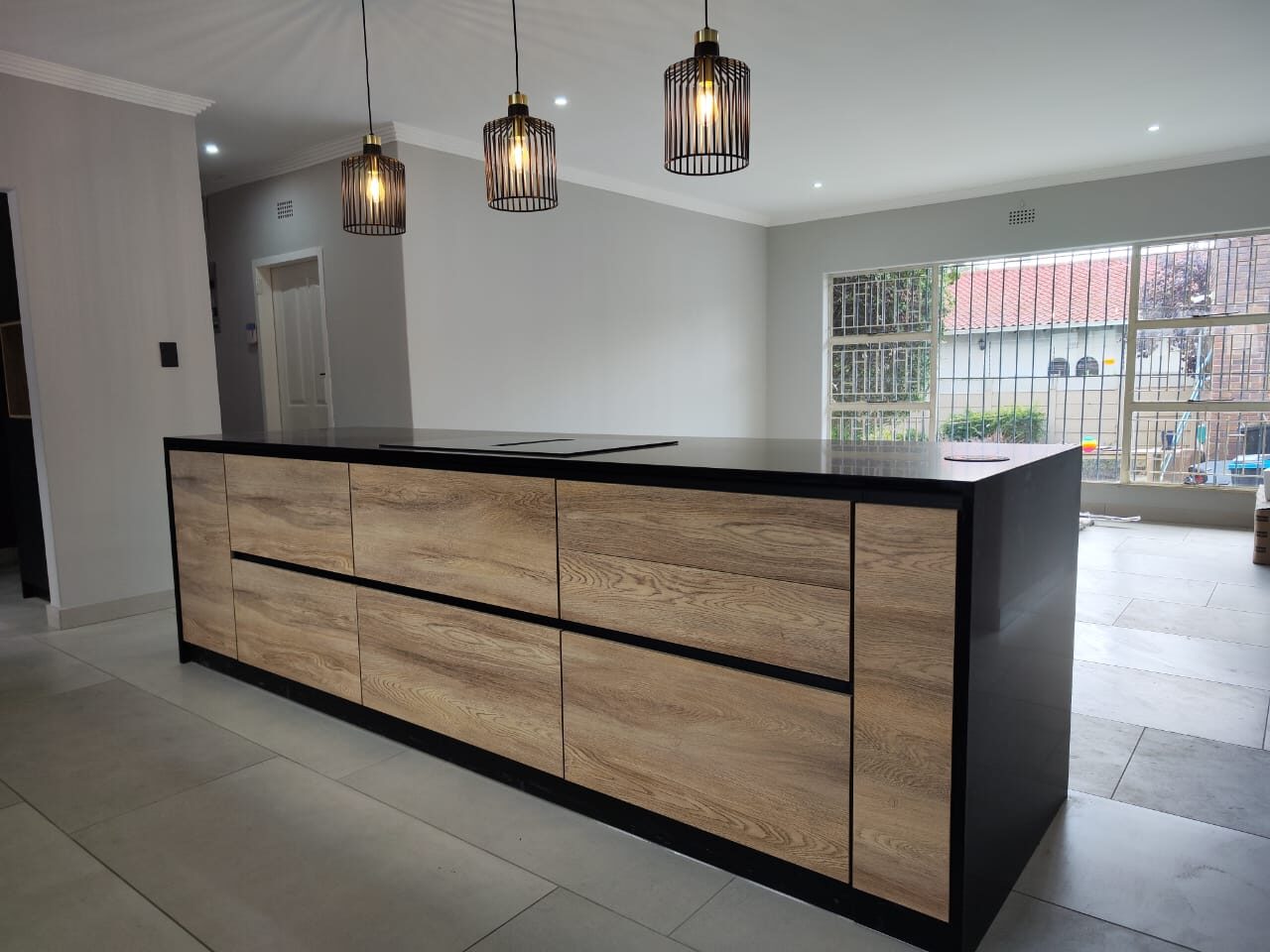 Oak island kitchen with black frame